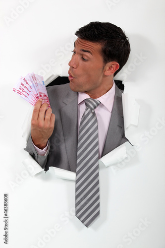 Photo: Businessman surprised at his windfall Businessman surprised at his windfall