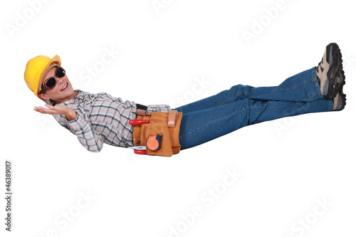 Photo: Female construction worker taking it easy Female construction worker taking it easy