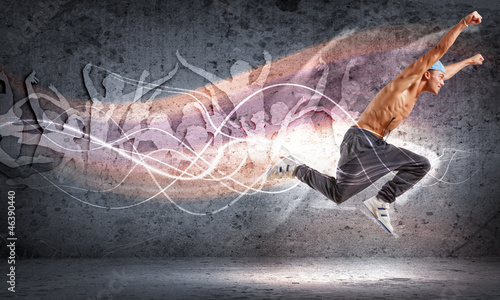Photo: young man dancing hip hop with color lines young man dancing hip hop with color lines