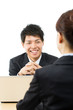 Young asian smiling businesswoman and businessman