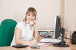 businesswoman  in office speaking by phone
