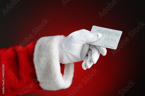 Photo: Santa Claus Hand Holding Credit Card Santa Claus Hand Holding Credit Card