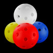 Photo: Four floorball balls isolated on a black background Four floorball balls isolated on a black background