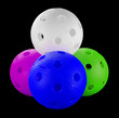 Photo: Four floorball balls isolated on a black background Four floorball balls isolated on a black background