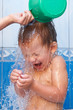 Photo: Baby in bathroom pouring water Baby in bathroom pouring water