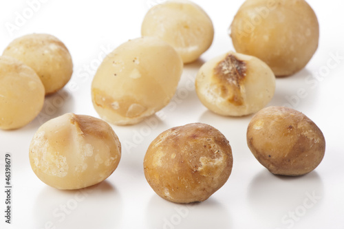 Photo: nuts of macadamia on white background nuts of macadamia on white background