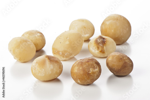 Photo: nuts of macadamia on white background nuts of macadamia on white background
