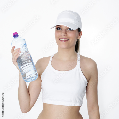 Photo: beautiful woman with bottle of water beautiful woman with bottle of water