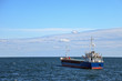 Foto: Lone cargo ship at sea Lone cargo ship at sea