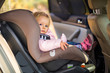 Infant baby girl in car seat