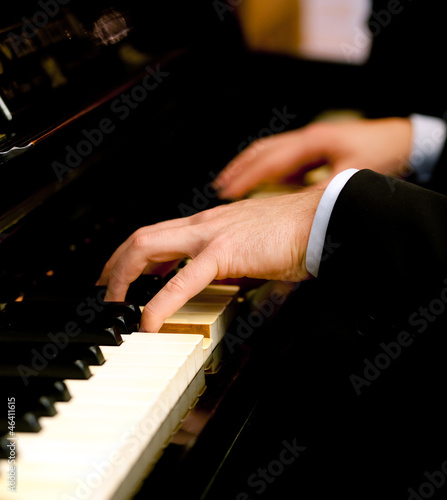 Photo: Man playing the piano Man playing the piano
