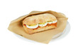 Photo: Luxury roll filet americain with egg on white background. Luxury roll filet americain with egg on white background.