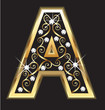 A gold letter with swirly ornaments