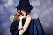 Style redhead girl with shopping bags.
