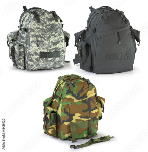 Photo: Military or survival hunters backpacks set isolated on white Military or survival hunters backpacks set isolated on white