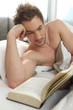 Man reading in bed