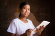 Myanmar girl using tablet computer