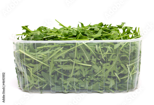 Photo: fresh rucola leaves isolated on white fresh rucola leaves isolated on white