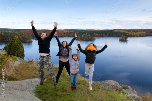 Photo: Family feel freedom in autumn scenery Family feel freedom in autumn scenery