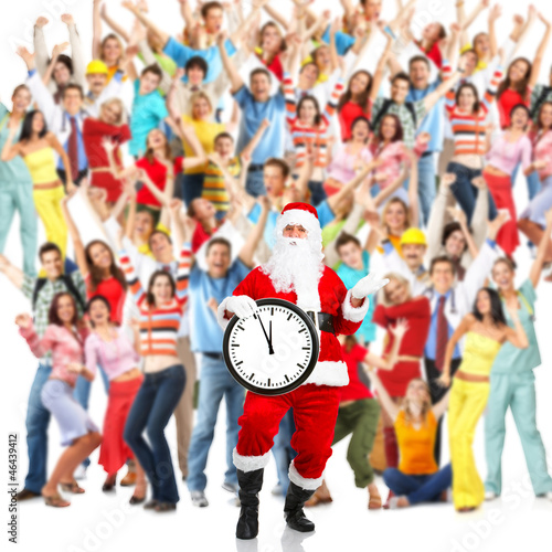 Photo: Christmas Santa and a group of happy people. Christmas Santa and a group of happy people.