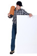 Roofer pointing at a board left blank for your message