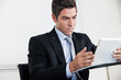 Young Businessman Using Digital Tablet