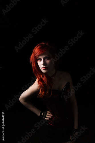 Photo: Female Vampire Posing While Waiting For Her Victim To Bite Female Vampire Posing While Waiting For Her Victim To Bite
