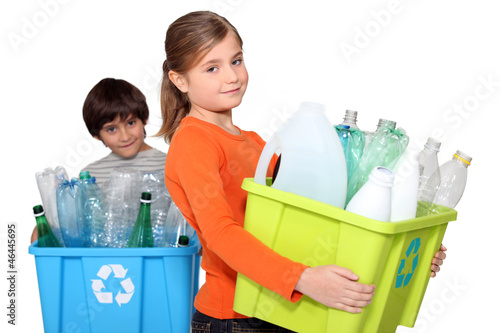 Photo: Children recycling plastic bottles Children recycling plastic bottles
