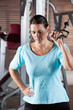 Woman Working Out In Health Club