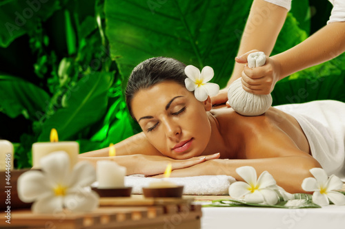 Photo: portrait of young beautiful woman in spa environment portrait of young beautiful woman in spa environment