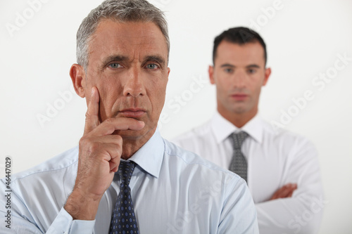 Photo: Pensive business team Pensive business team