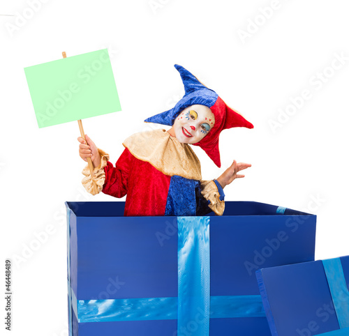 Photo: Clown with blank card Clown with blank card