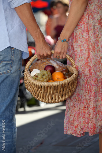 Photo: Couple shopping at local market Couple shopping at local market