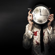 Dead Business Person Holding End Of Time Clock