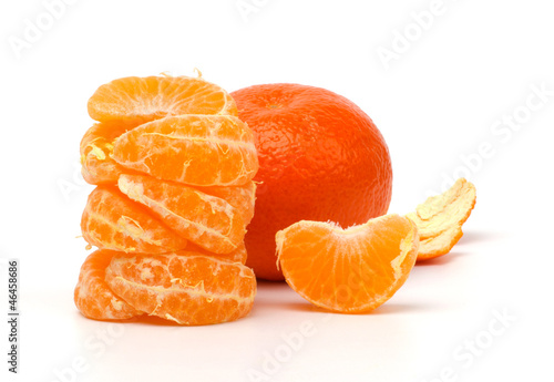 Photo: Ripe tangerines isolated on white background Ripe tangerines isolated on white background