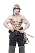 Portrait of handsome man posing on black background in fireman c