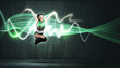 Young woman dancer. With lights effect.