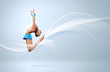 Young woman in gymnast suit posing