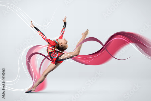 Photo: Young woman in gymnast suit posing Young woman in gymnast suit posing