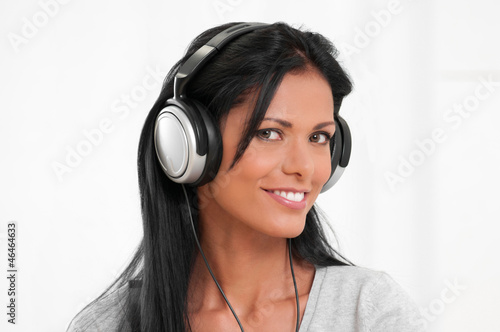 Photo: Happy girl listening music Happy girl listening music
