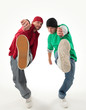 Photo: hip-hop style dancers posing on isolated background hip-hop style dancers posing on isolated background