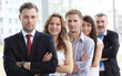 Group portrait of a professional business team looking at camera