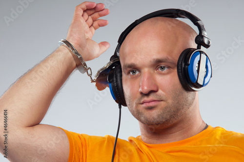 Photo: man with earphones man with earphones