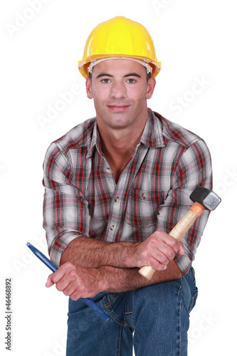 Photo: A male sculptor. A male sculptor.