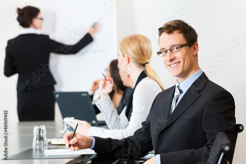 Photo: Business - businesspeople, meeting and presentation in office Business - businesspeople, meeting and presentation in office