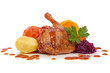Roast goose leg with red cabbage and apples. 