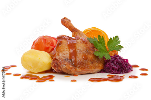 Photo: Roast goose leg with red cabbage and apples. Roast goose leg with red cabbage and apples.