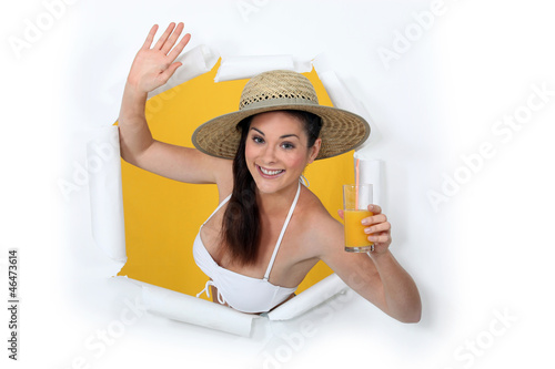 Photo: Woman with glass of orange juice Woman with glass of orange juice