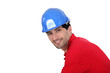 Man wearing a blue hardhat