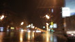 car window rain night background defocused in motion